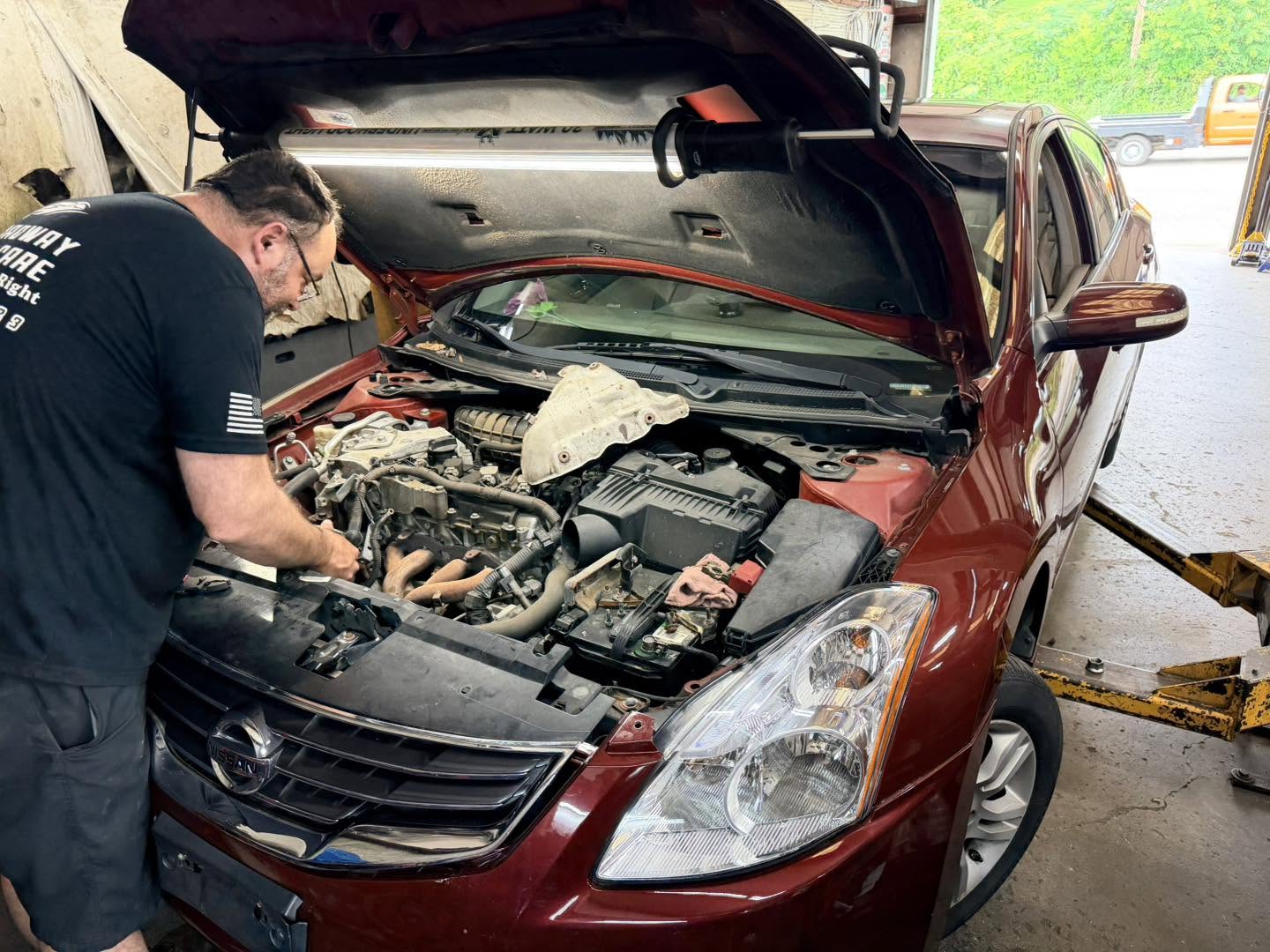 Technician completing a digital vehicle inspection